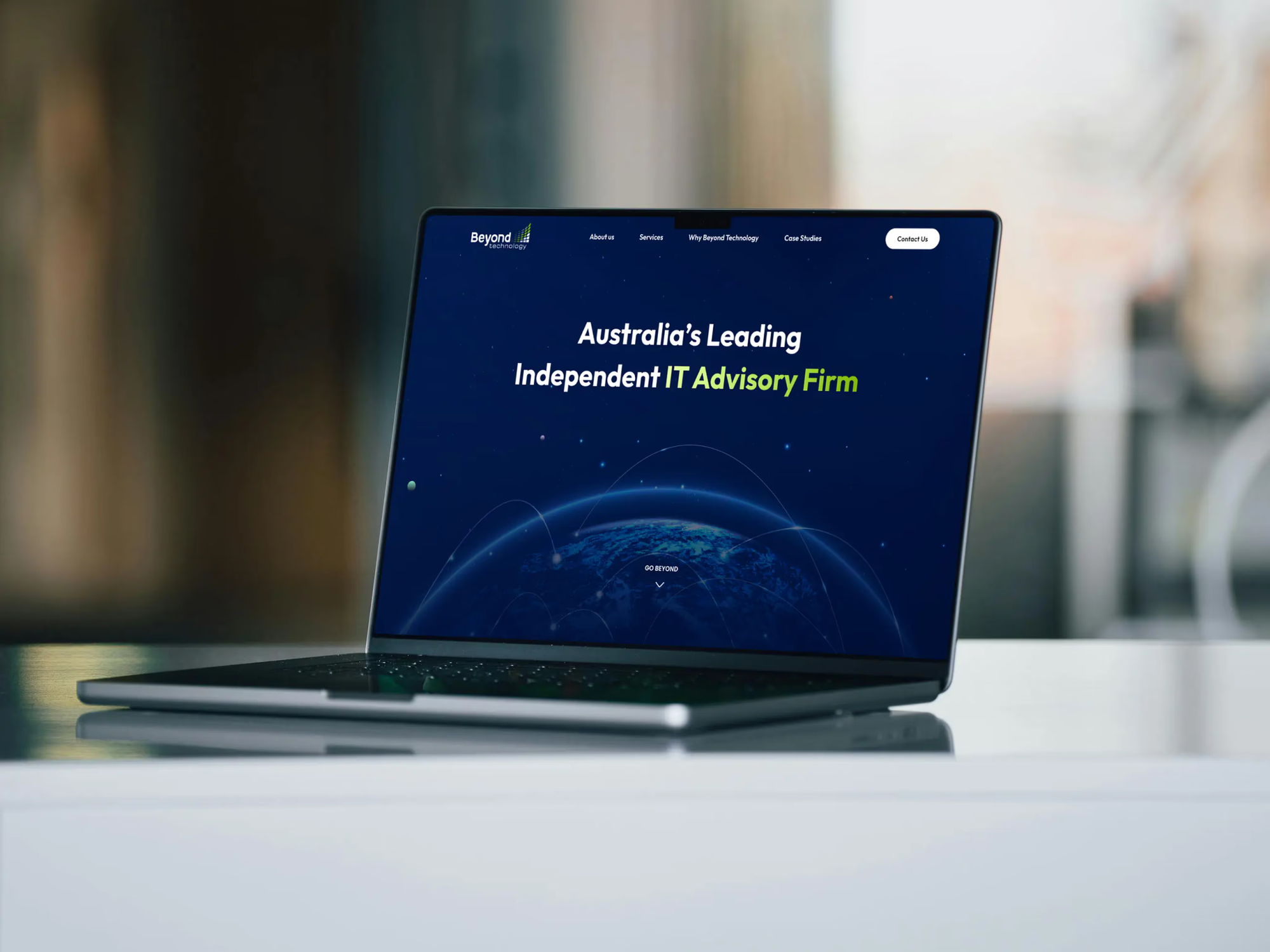 IT Advisory Firm, landing page on a laptop